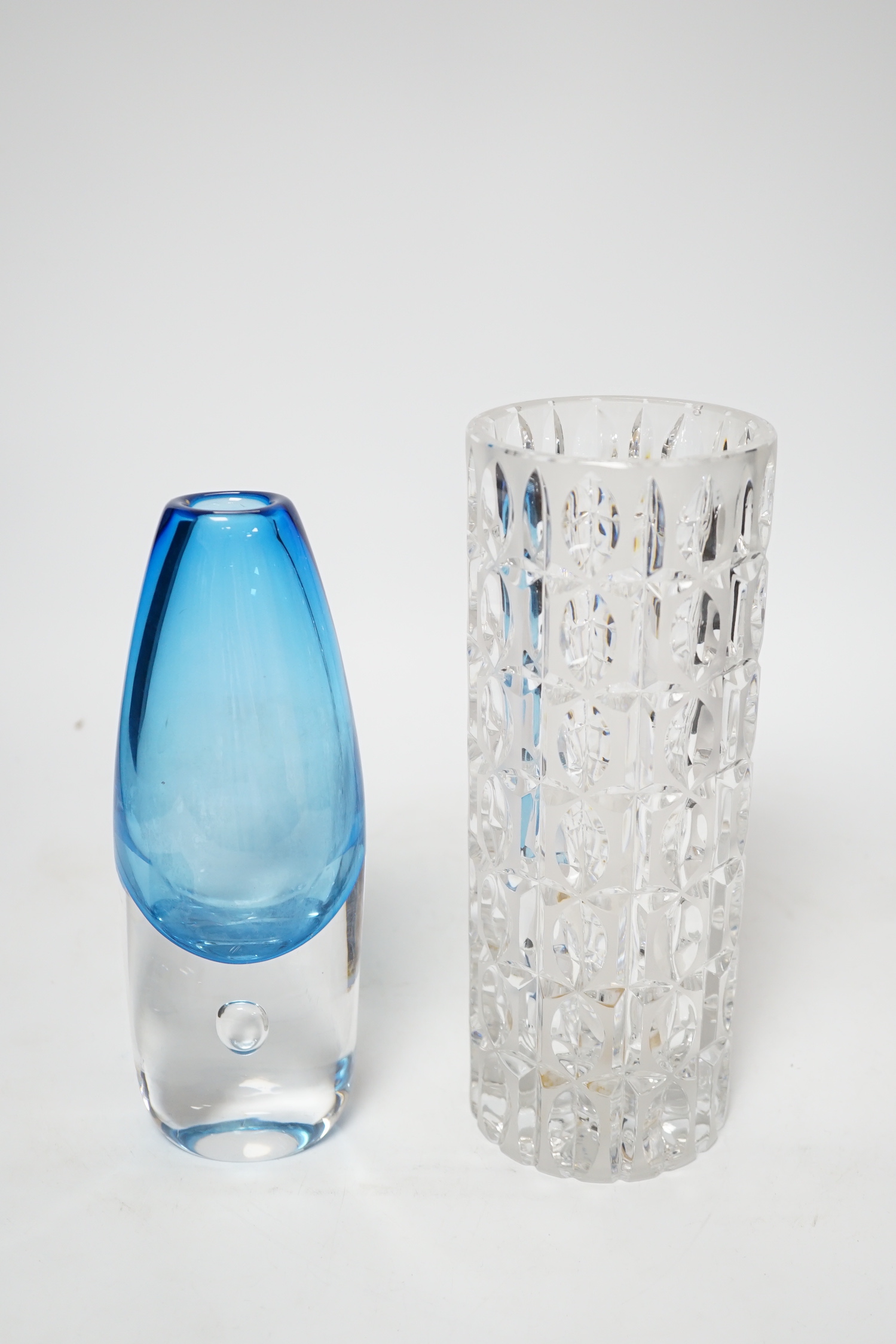 An Orrefors blue glass vase and a similar cut glass vase, tallest 24cm (2)